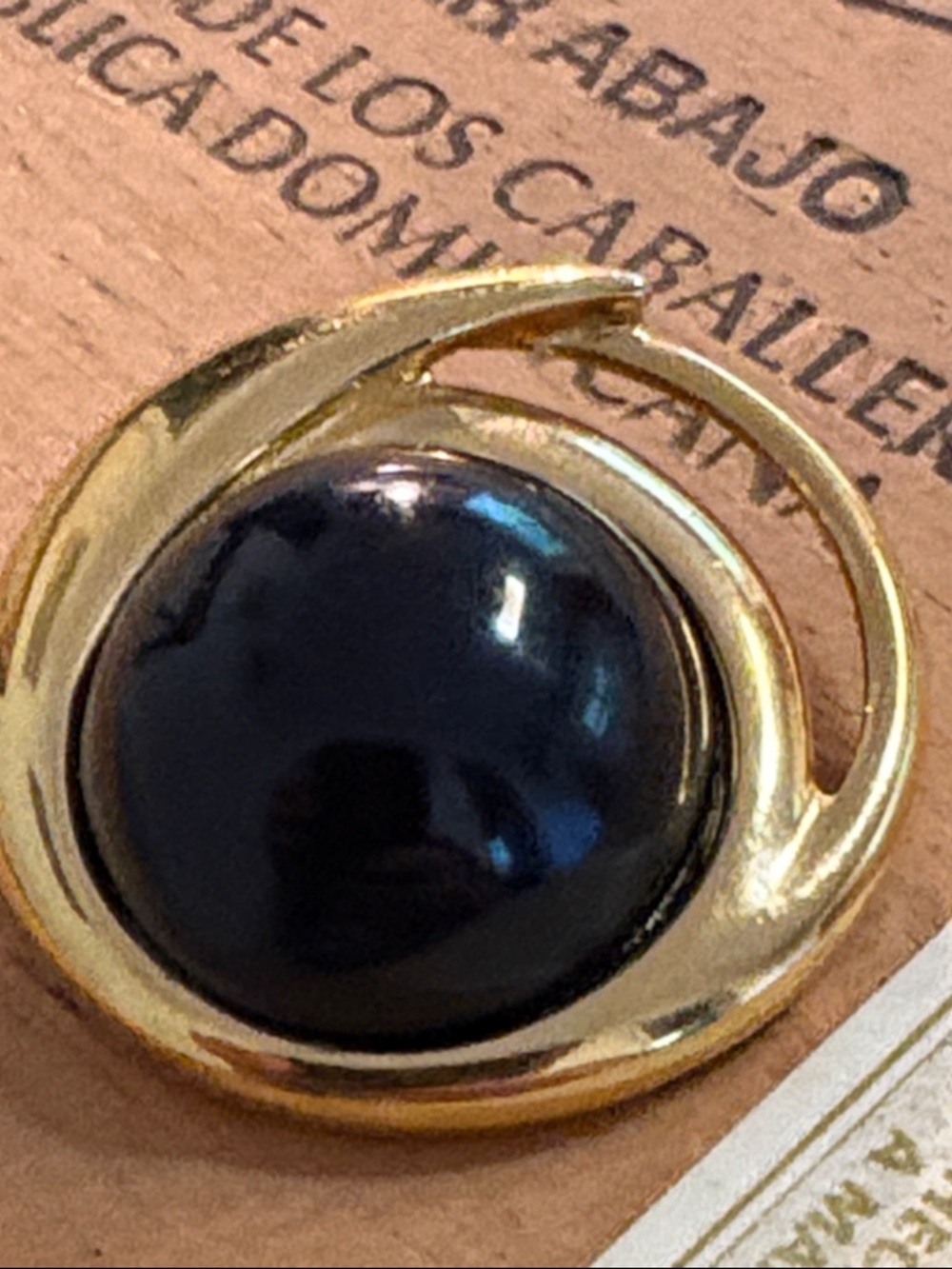 Monet Gold Tone Brooch with Black Cabochon
